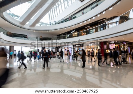 Blurred shopping mall background Royalty-Free Stock Photo #258487925
