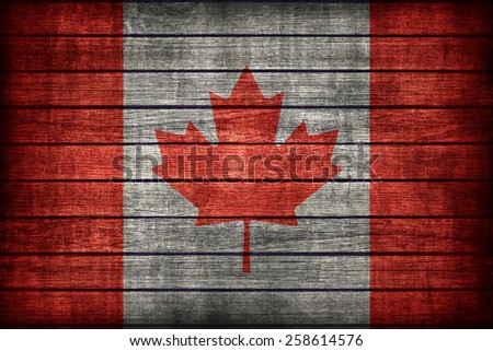 Canada flag pattern on wooden board texture ,retro vintage style