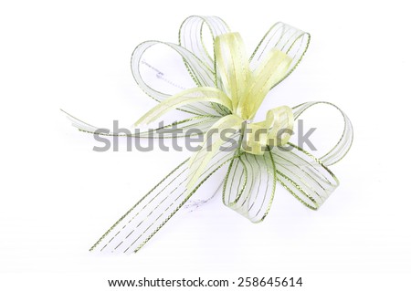 Green and white ribbon Bow isolated on White Background