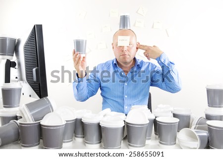 Businessman with coffee addiction