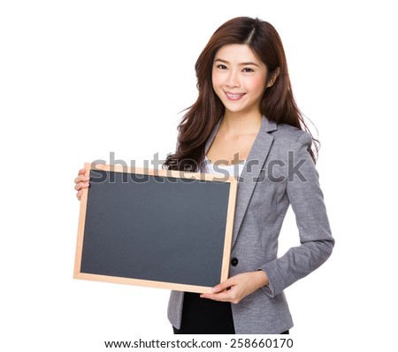 Business woman show with chalkboard