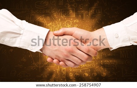 Business hanshake with with glowing background