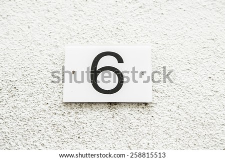 Number six on the wall of a house, number of information, even number