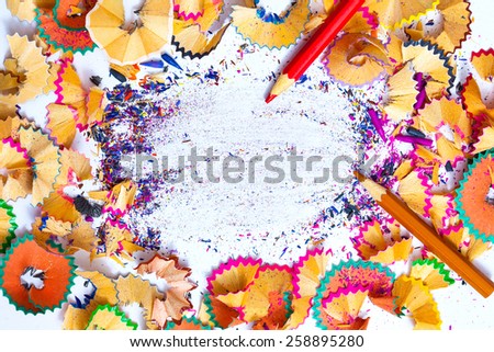 colored pencil shavings with copy-space, close up