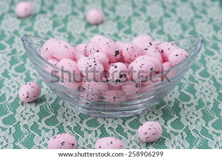 Pink Easter eggs in a glass bowl