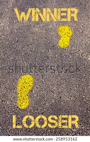 Yellow footsteps on sidewalk from Loser to Winner message. Concept image