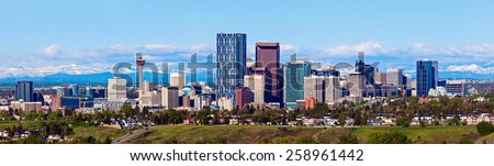 Panorama of Calgary and Rocky Mountains. Calgary, Alberta, USA Royalty-Free Stock Photo #258961442