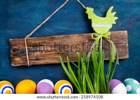 Wooden board for text and Easter decorations