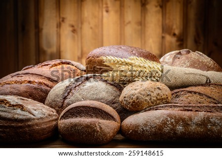 fresh bread  and wheat on the wooden