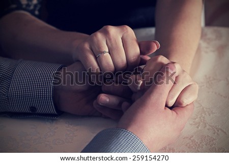 man and woman holding hands, vintage style effect picture 