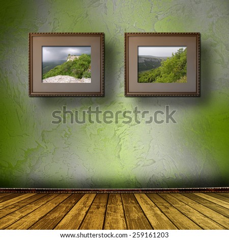 Photos of the Crimea in the old wooden frame on the wall
