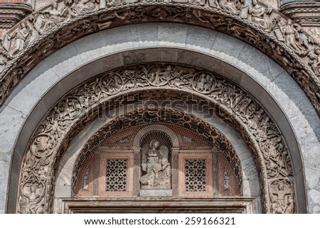 Bas-relief arch over the gate to the Saint Marks Basilica (Patriarchal Cathedral Basilica of Saint Mark) in Venice, Italy