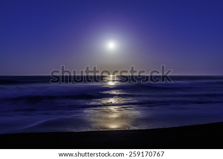 Super / Full Moon setting / rising on Moonstone Beach, along the Big Sur Highway, on the California Central Coast, near Cambria CA.
