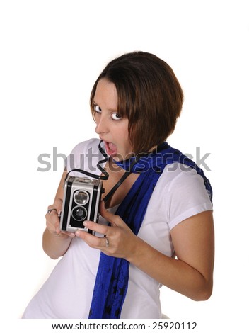 Teen girl with old camera