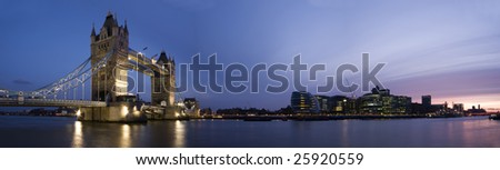 Panoramic evening time shot of Tower Bridge and city of London.including City Hall, HMS Belfast and London Bridge. (Stitched from multiple images)