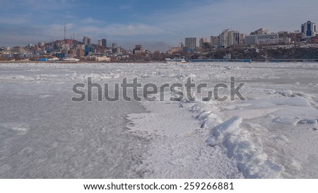 Vladivostok cityscape, day. Winter. View of the city from the Sea of Japan.