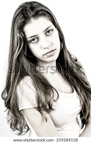 Unhappy girl portrait isolated