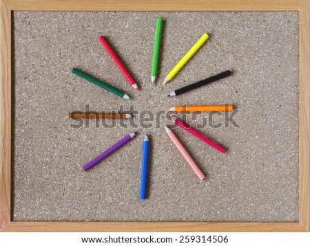 	Board and colored pencils