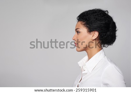 Closeup profile of confident business woman looking forward isolated on gray background Royalty-Free Stock Photo #259315901