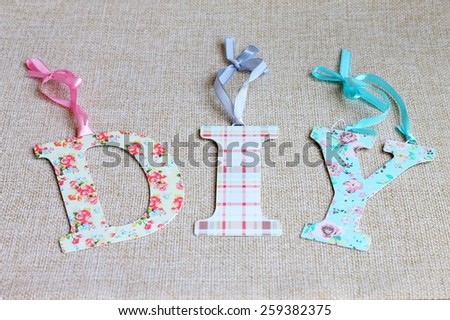 DIY words for Do It Yourself concept Royalty-Free Stock Photo #259382375