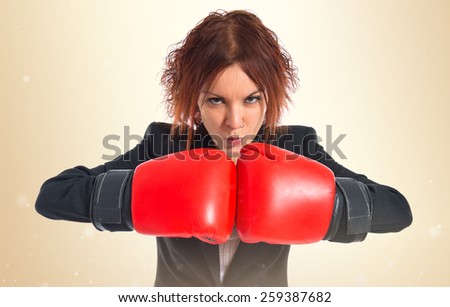 Redhead girl with boxing gloves 