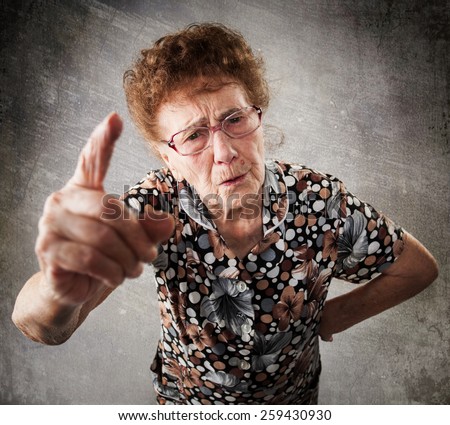 Scolded the old woman. Senior gives instruction. Anger grandmother Royalty-Free Stock Photo #259430930