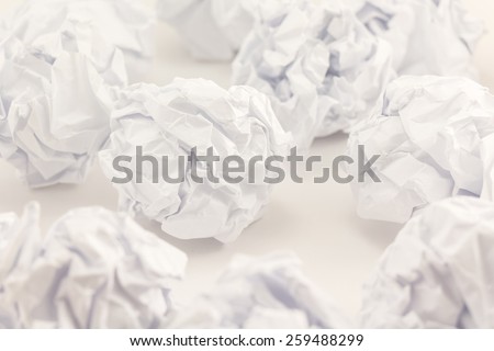 Paper white crumpled balls background