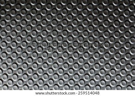 black plastic surface with rough texture