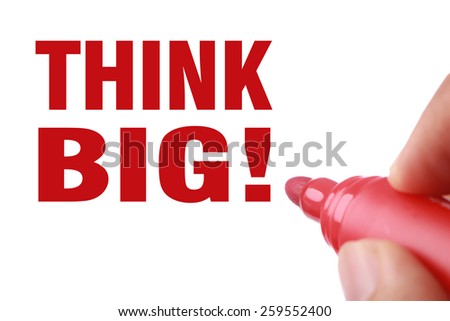 Think big text is written by red marker on white paper.