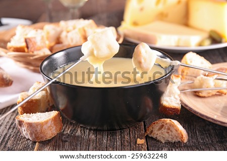 cheese fondue Royalty-Free Stock Photo #259632248