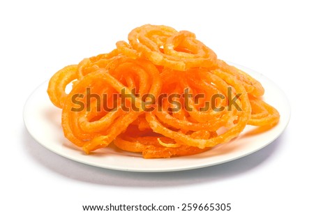 jalebi Indian sweet dish isolated on white background Royalty-Free Stock Photo #259665305