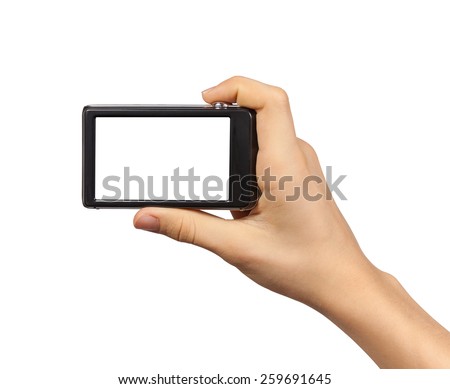 Compact photo camera in hand isolated on white background
