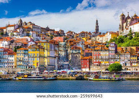 Porto, Portugal old town skyline from across the Douro River. Royalty-Free Stock Photo #259699643