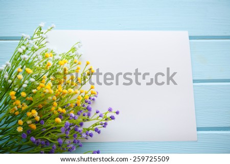 Spring Blossom flowers over clear wood background. 