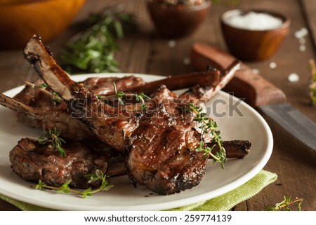 Organic Grilled Lamb Chops with Garlic and Lime Royalty-Free Stock Photo #259774139