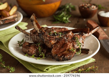 Organic Grilled Lamb Chops with Garlic and Lime Royalty-Free Stock Photo #259774196