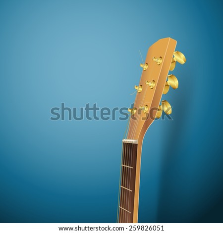 acoustic guitar head on blue background
