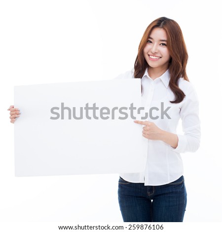 Young Asian woman holding a white borad isolated on white background.