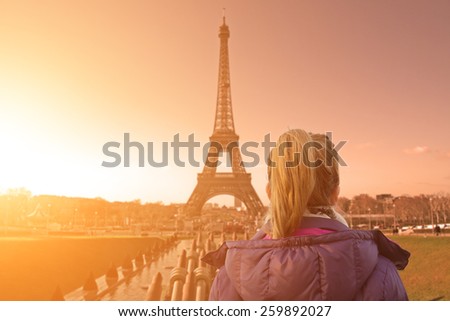 A look at the Paris and Eiffel tower from Trocadero with lonesome girl. Conceptual mosaic.