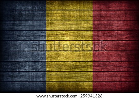 Chad flag pattern on wooden board texture ,retro vintage style