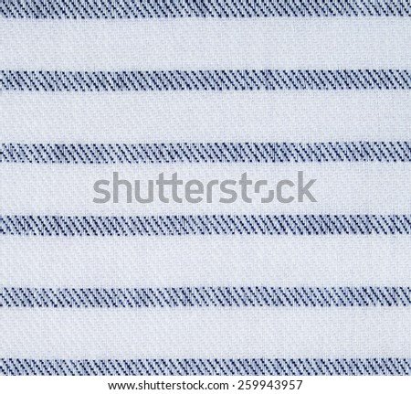 Navy blue and white striped cotton fabric texture.