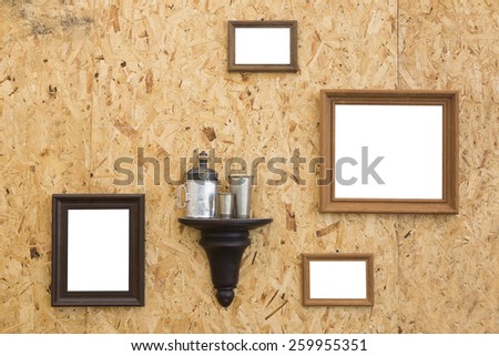Photo frames on the wooden floor