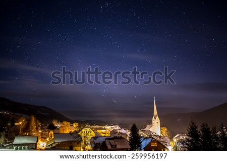 Beautiful view of clean night starry sky over highland Austrian town