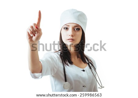 Medical doctor woman smile, nurse wear white surgery suit, point finger to corner up, concept of advertisement product, empty copy space. Isolated over white background