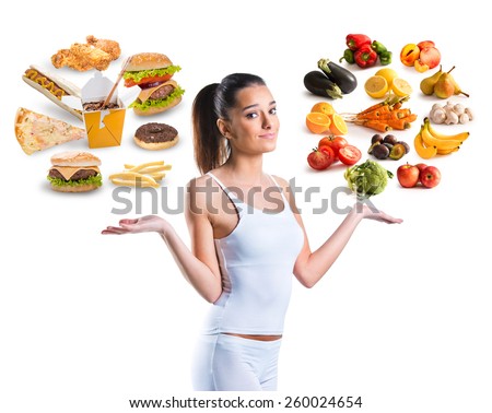Unhealthy vs healthy food Royalty-Free Stock Photo #260024654