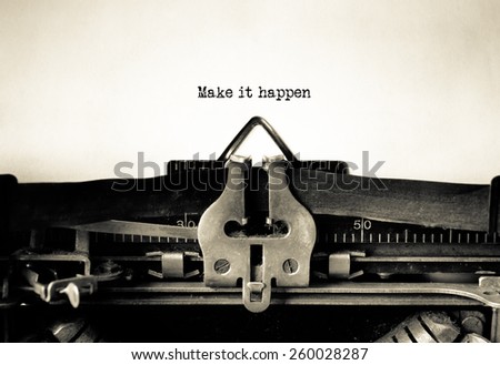 Make it Happen typed on vintage typewriter Royalty-Free Stock Photo #260028287