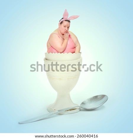 Egg with funny Easter Bunny. Weight loss concept. Retro look filtered picture.