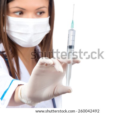 Doctor woman hand with syringe needle for injection looking at the corner isolated on a white background. Focus on hand with syringe