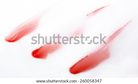 Red lip gross brush stroke on background