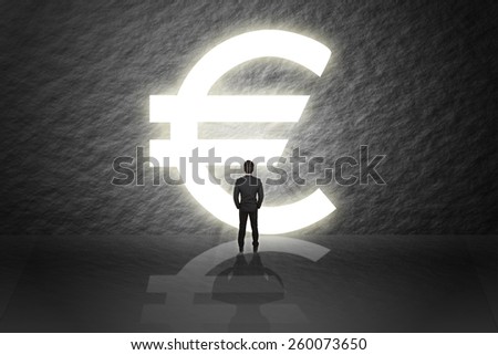 Businessman in suit standing and looking aim the gate(door) success euro pound money sign isolated cement abstract background.